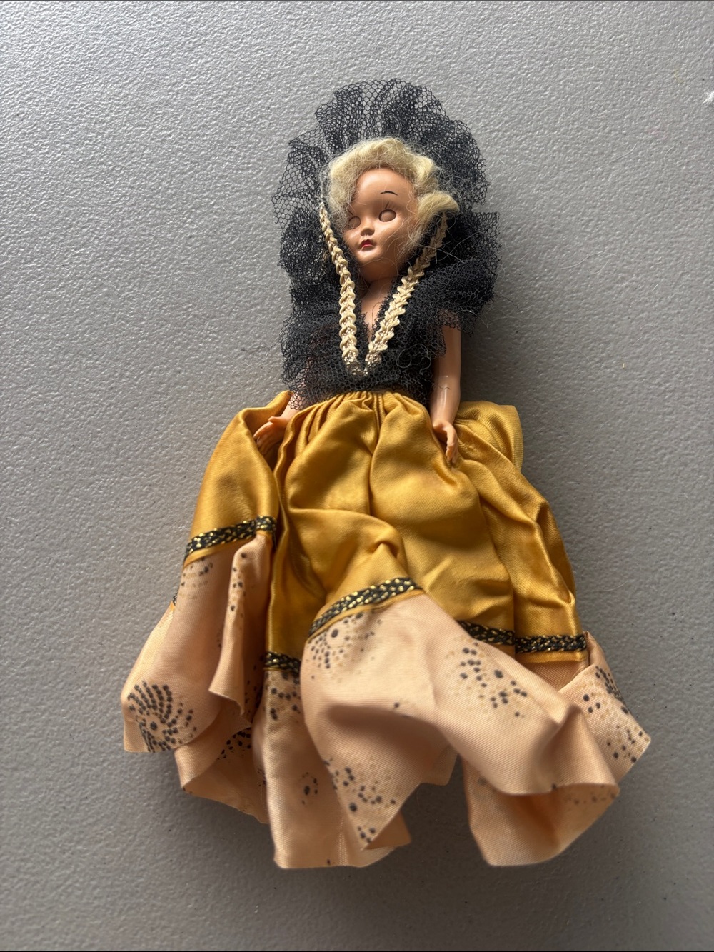 Vintage-Inspired Gold and Black Decorative Doll Accent